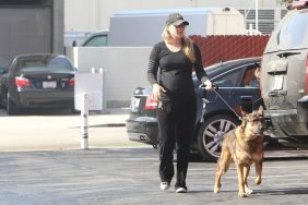 Ali Larter, black pants, black top, dog