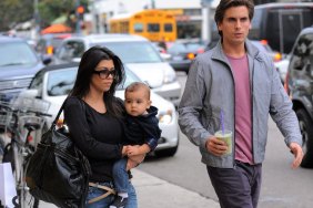 Kourtney Kardashian, jeans, tan belt, black bag, sunglasses, black shirt, Mason Disick, Scott Disick