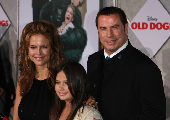 John Travolta, black sweater, Kelly Preston, black dress, Ella Bleu