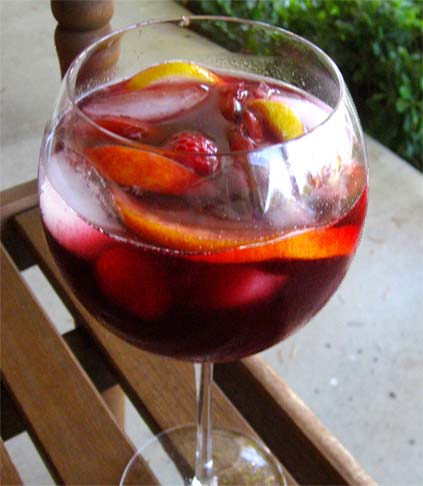 A glass of homemade raspberry sangria