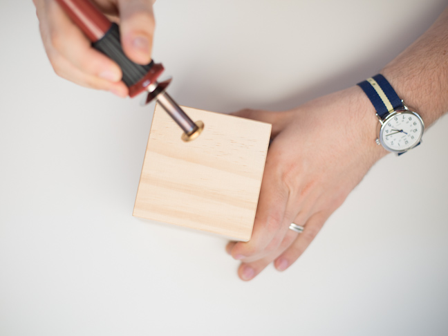 block-hands-watch-woodburner