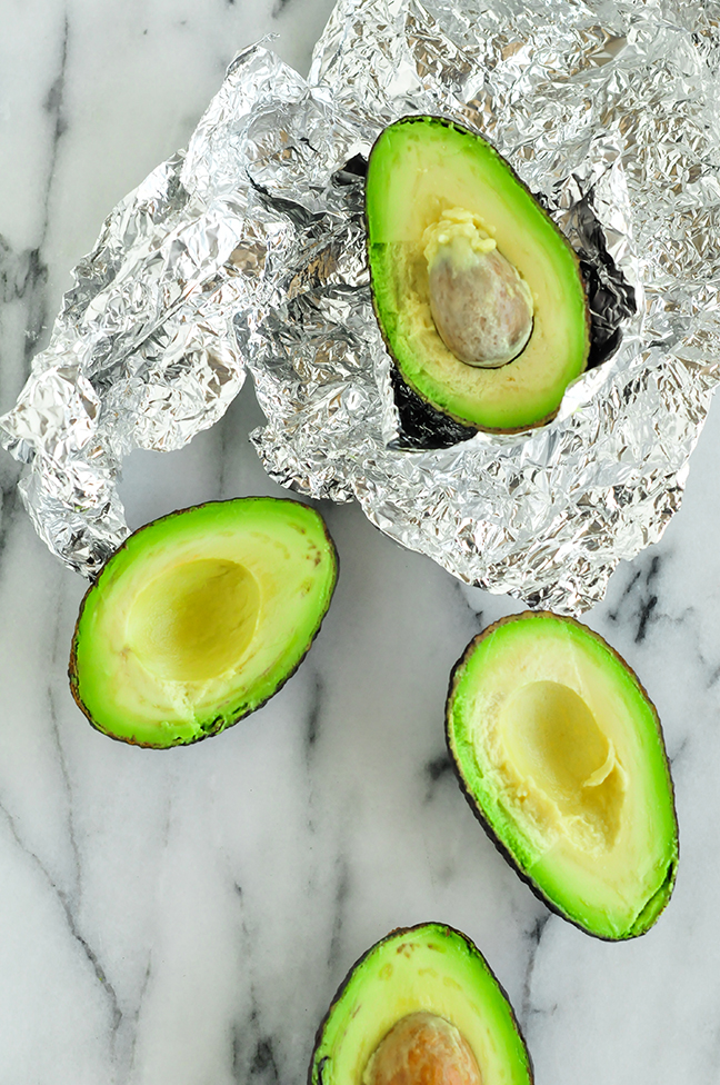 half avocados in foil