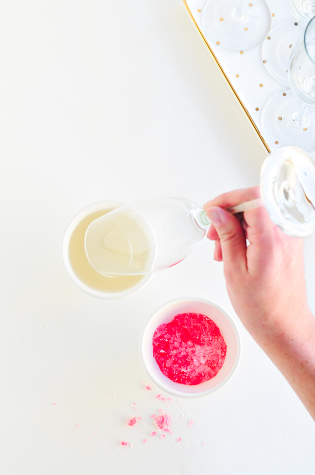 dipping champagne flute in simple syrup