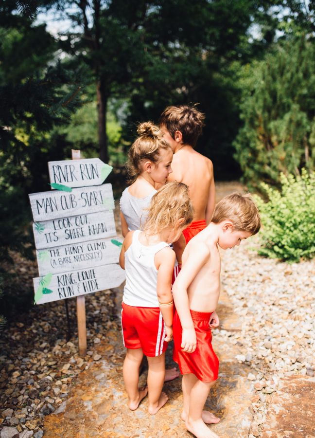 obstacle-course-sign-kids-red-shorts