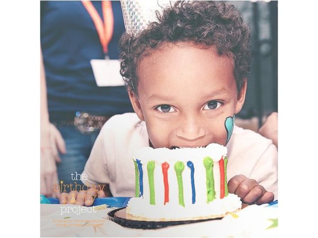 child eating small cake