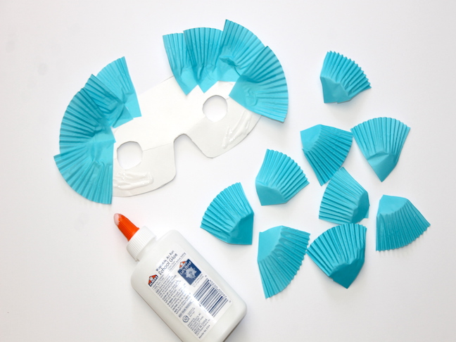 Owl Cupcake Liner Maskstep 9 white mask with blue cupcake liner feathers