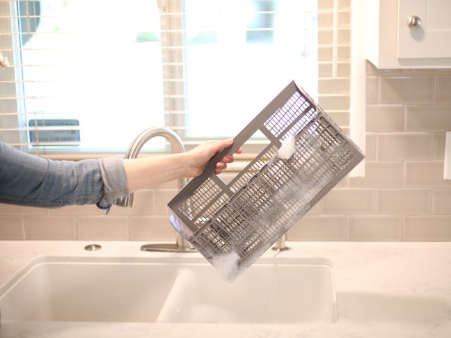 hand-holding-silverware-tray