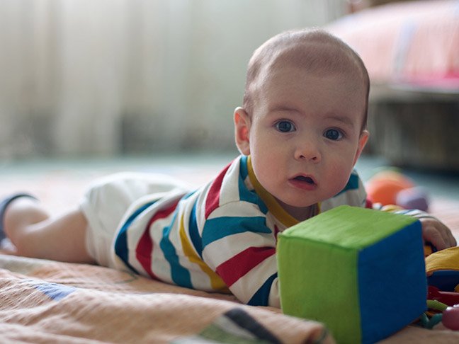 when do babies hold head up