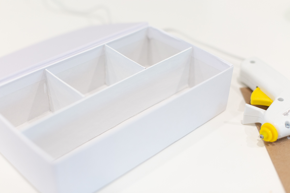 Chipboard glued into pencil box Chipboard glued into pencil box