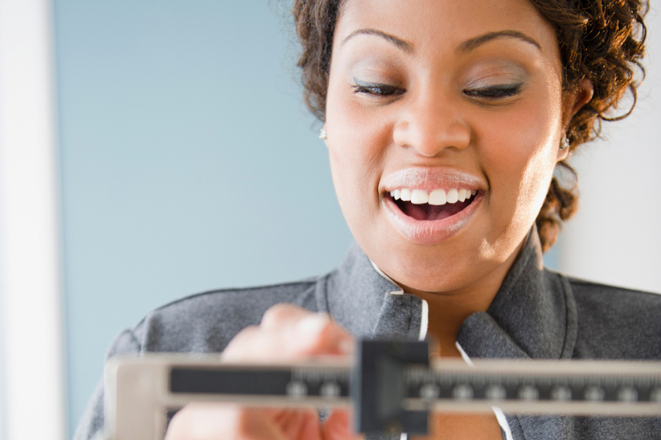 Woman Happy About Weight Loss