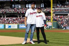 Travis Kelce #87 of the Kansas City Chiefs and his mom, Donna Kelce, stand on the field before the first pitch during the game between the Seattle Mariners and the Cleveland Guardians at Progressive Field on Friday, April 7, 2023 in Cleveland, Ohio.