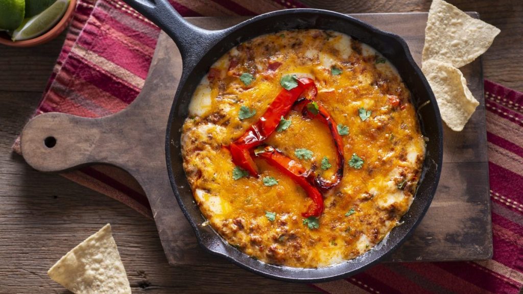 Queso Fundido with Chorizo in a Cast Iron Skillet for Super Bowl party