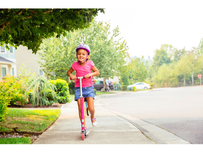 Riding scooters (or skateboards)